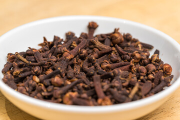 cloves in a white bowl