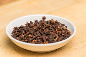 cloves in a white bowl