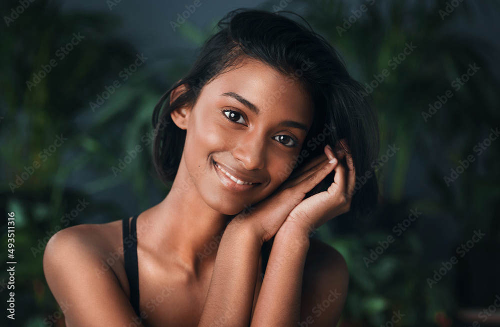 Sticker pure beauty lies in being your unique self. shot of a beautiful young woman posing against a dark ba