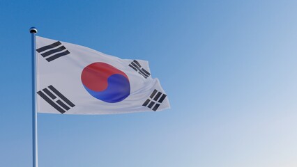 the flag of South Korea in the wind against the blue sky.
