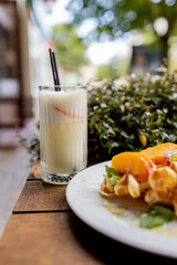 Waffles breakfast with fruit and vegetables omelet camembert