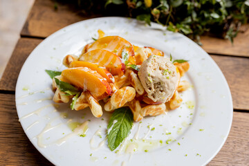 Waffles breakfast with fruit and vegetables omelet camembert