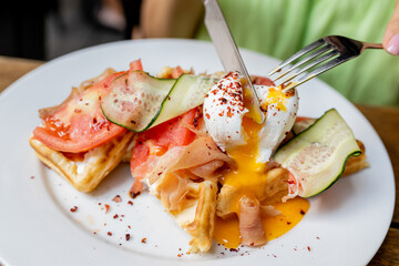 Waffles breakfast with fruit and vegetables omelet camembert