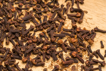 cloves on wooden background