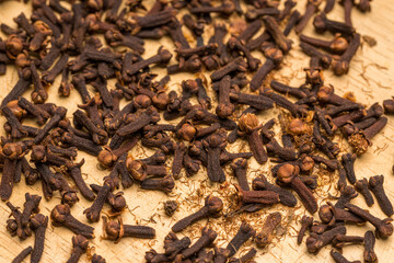 Close up of cloves on a wooden background