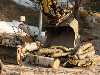 Finland. Espoo. March 18, 2022 . Tractor with bucket .Concept repair, construction