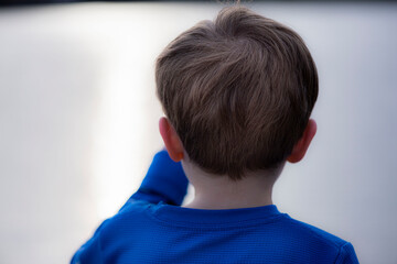 Young Boy on Pier