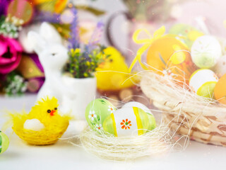 Bright Easter card with colorful eggs, funny chickens, flowers and other elements. Bright colorful festive background.