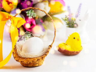 Bright Easter card with colorful eggs, funny chickens, flowers and other elements. Bright colorful festive background.