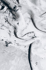 Fabric texture black and white natural silk marble print, tie-dye technique.