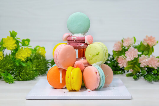 A front view french macarons round delicious colorful