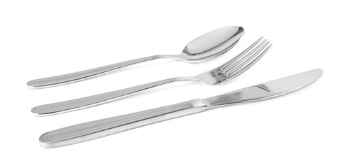 Fork, knife and spoon on white background