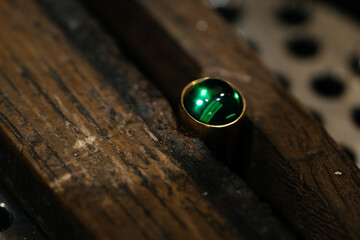 Craft jewelery making with professional tools. Ring repairing. Putting the diamond on the ring. Macro shot. A handmade jeweler process, manufacture of jewelery.