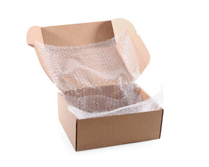 Open cardboard box with bubble wrap isolated on white