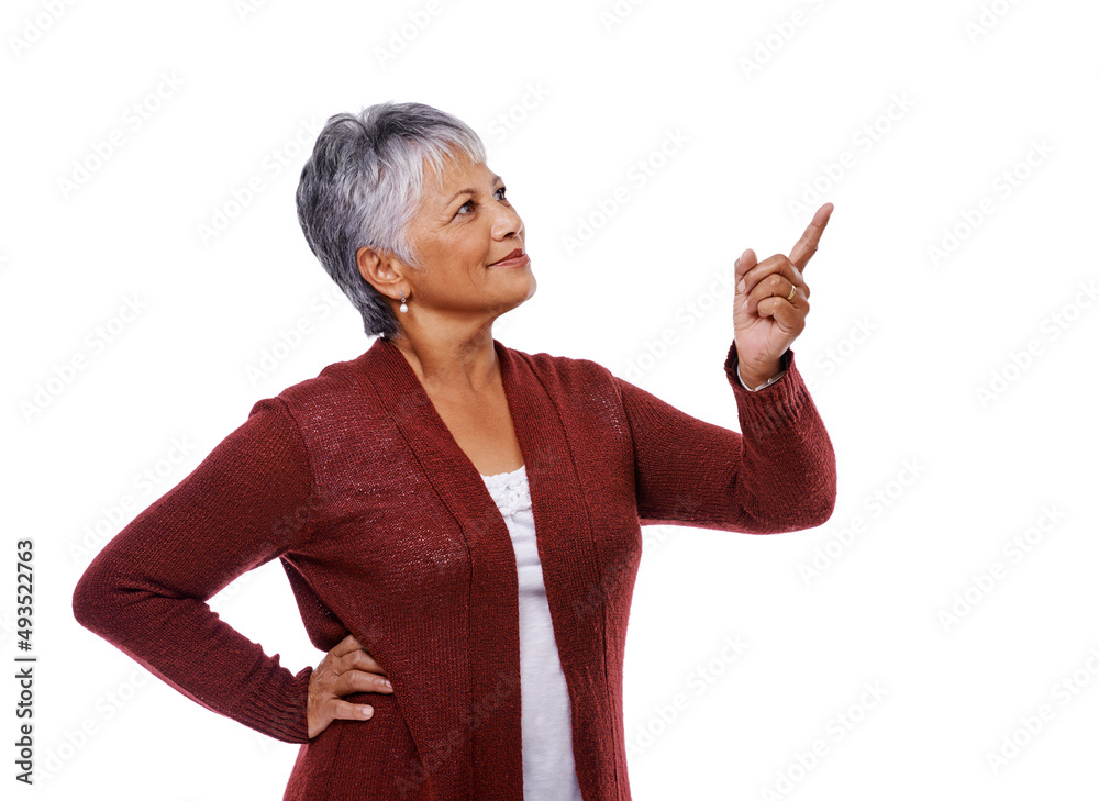 Sticker Mature lifestyle. Studio shot of a mature woman pointing to copyspace isolated on white.