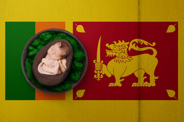 Newborn portrait on background in color of national flag. Patriotic photography concept. Sri Lanka