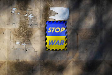 Poster stop the war on a yellow-blue sign in the colors of the flag of ukraine. Poster calling for...