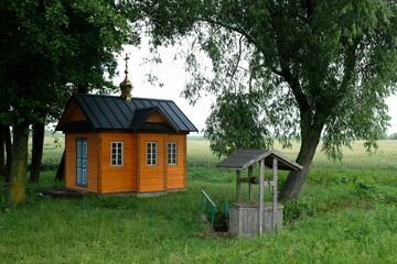 Orthodox chapel and wooden well in a place called 