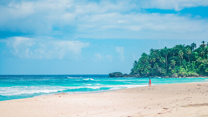 Beach white sand on atlantic ocean in Samana peninsula