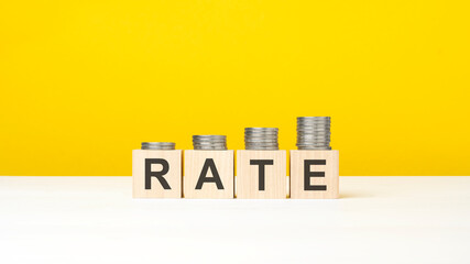 text rate on wooden cubes on yellow background