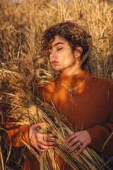 Young beautiful woman with eyes closed enjoying the sun