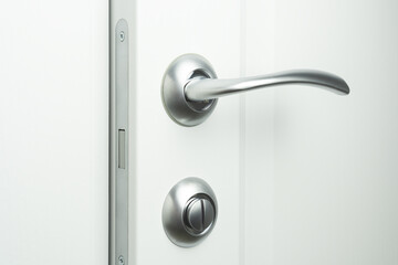 Door handle with lock and modern magnetic latch. Interior doors fittings.