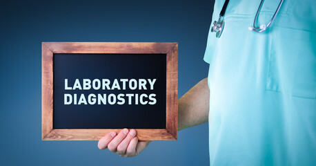 Laboratory Diagnostics. Doctor shows sign/board with wooden frame. Background blue