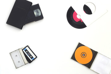 Vinyl record, cd, audio and video cassettes top view	