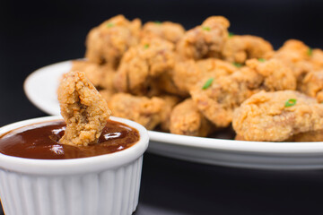 Crisp chicken slices in barbecue sauce