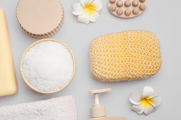 Set of bath supplies with bath sponge on white background, closeup