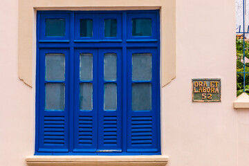 A blue window of the simple house