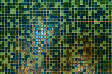 Green modern Mosaic tiles on wall. Sauna room interior design with mosaic.