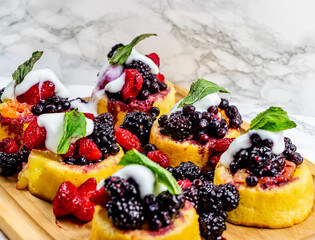 Mixed berry tart with vanilla yogurt. Calgary, Alberta, Canada