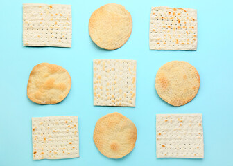 Different Jewish flatbread matza for Passover on color background