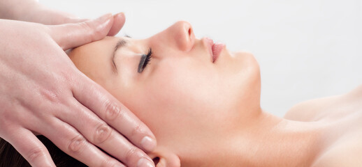 Obraz na płótnie Canvas Girl getting back massage in massage salon, health spa