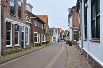 Fototapeta na wymiar Den Hoorn on Texel Island with traditional brick houses