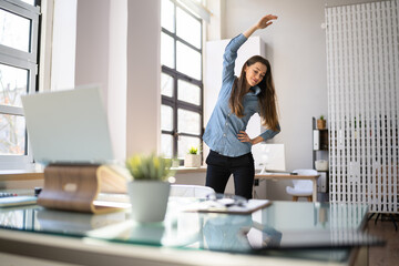 Woman In Hijab Standing And Stretching In Front