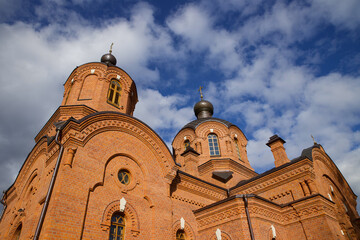 Fragment of an orthodox temple building on a background of the sky.