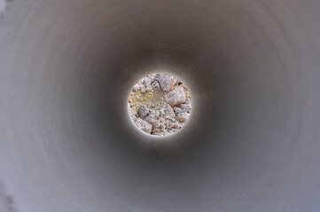 interior view of a concrete pipe for highway construction