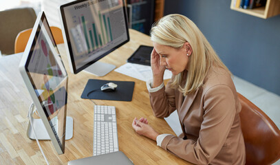 Todays just not her day. Shot of a mature businesswoman looking stressed out while working in an office.
