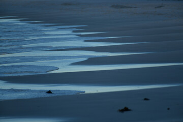 Dreamy beach shoreline at low tide