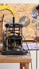 Industrial machine maintenance. Mechanic doing maintenance on woodworking machine.