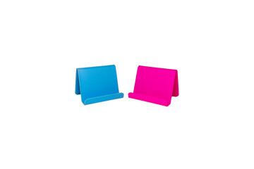 Stand for cell phone, blue plastic and pink plastic material on a white background