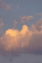 orange and pink dark clouds at sunset