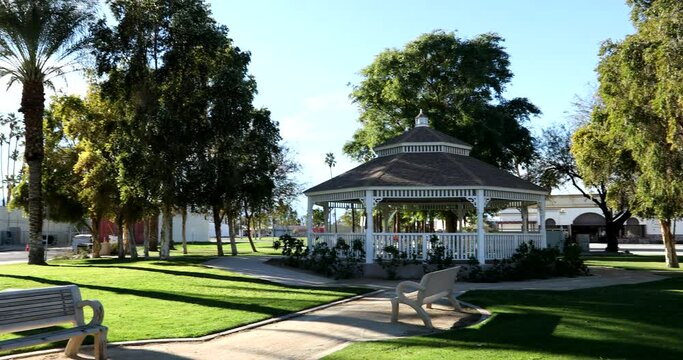 Late afternoon view of a public park in downtown Indio, California, USA.