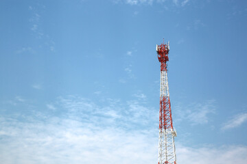 telecommunication antenna little clouds and blue sky