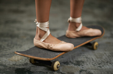 Grace on wheels. A cropped image of a woman in ballet slippers on a skateboard.