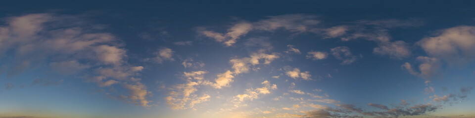 Dark blue sunset sky panorama with Cumulus clouds. Seamless hdr pano in spherical equirectangular format. Complete zenith for 3D visualization, game and sky replacement for aerial drone 360 panoramas.