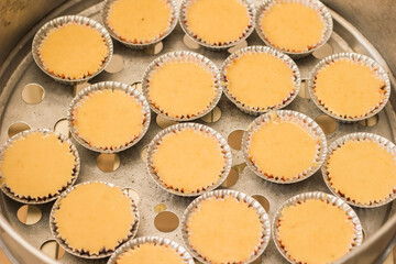 Baked pastry is placed in a container. Ready with the heat vapor.
