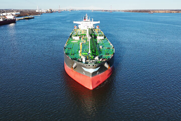 Aerial Drone View of Crude Oil Tanker Leaving Port 